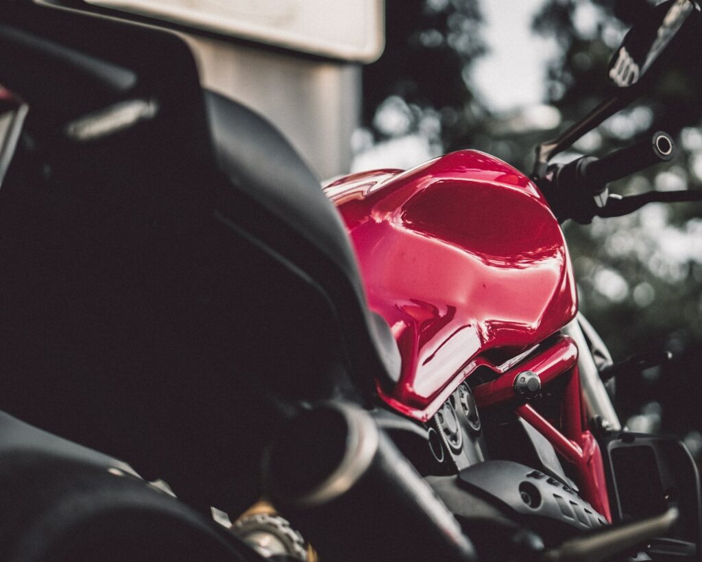 red and black sports bike during day