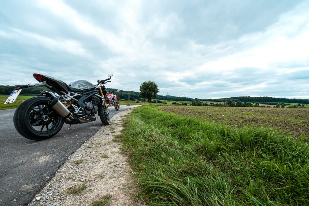 a motorcycle parked on the side of the road